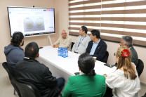 Reunión en el salón de reuniones de CINEMI.