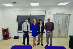 Representantes de la UTP y UPN en el salón de conferencias VIPE.